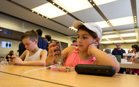 Apple flagship store, 5th Ave.  NYC. Some of the youngest customers