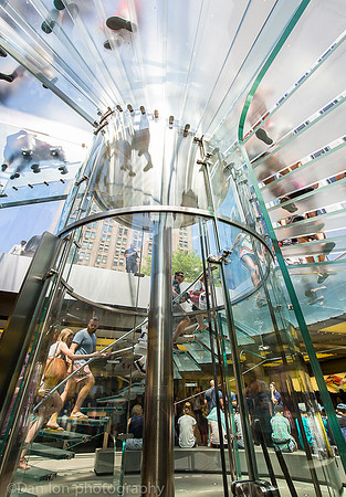 Apple flagship store, 5th Ave.  NYC. All glass entrance and elevator.